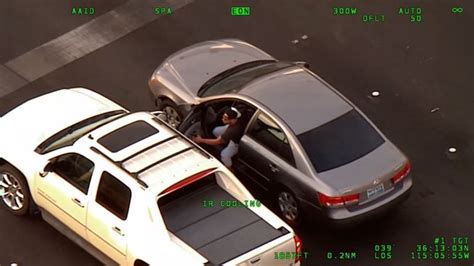 video captures carjacking suspect crashing head on into a police car cnn