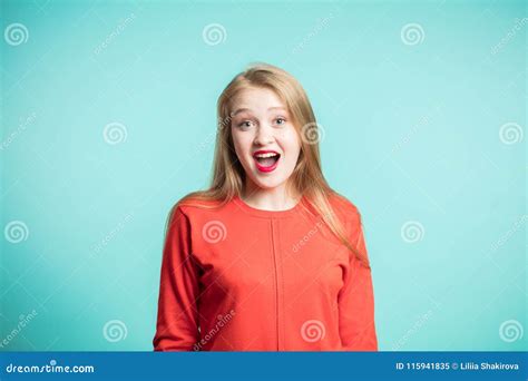Shocked Beautiful Woman With Opened Mouth Looking Closeup Portrait On