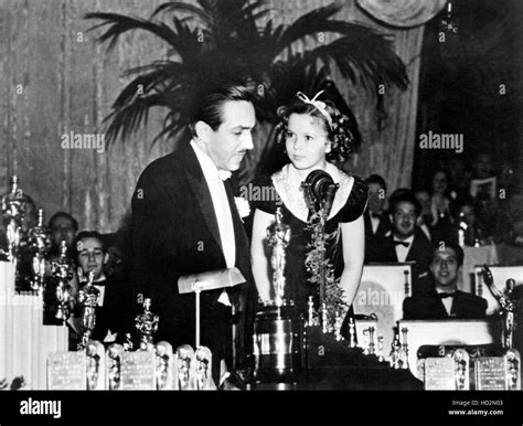 Shirley Temple Right At The Academy Awards Presenting Walt Disney
