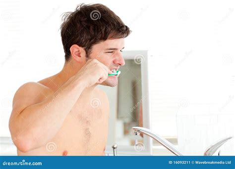 Handsome Young Man Brushing His Teeth In Bathroom Stock Image Image Of Bathroom Hygiene 16093211