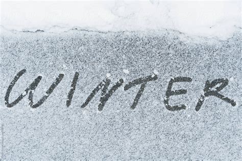 Winter Written In Snow By Stocksy Contributor Kristin Duvall Stocksy