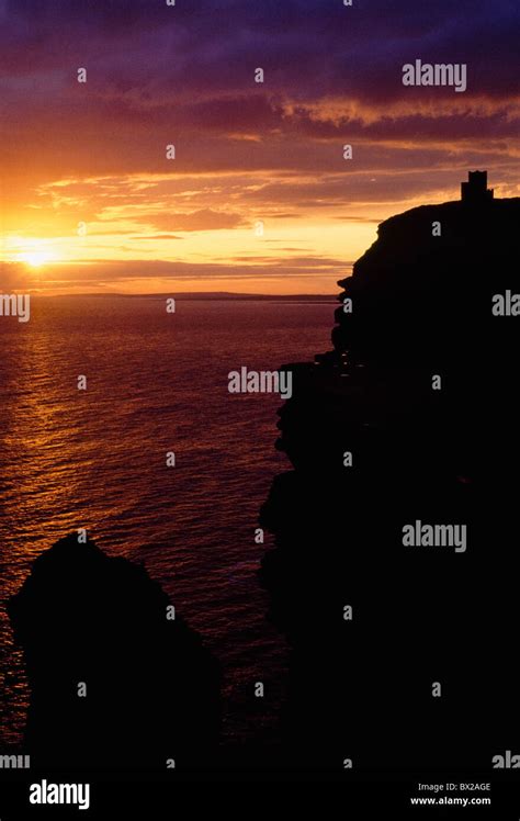 The Cliffs Of Moherco Clareirelandsea Cliffs At Sunset Stock Photo