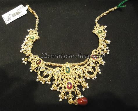 Gold Necklace With Uncuts And Pearls Jewellery Designs