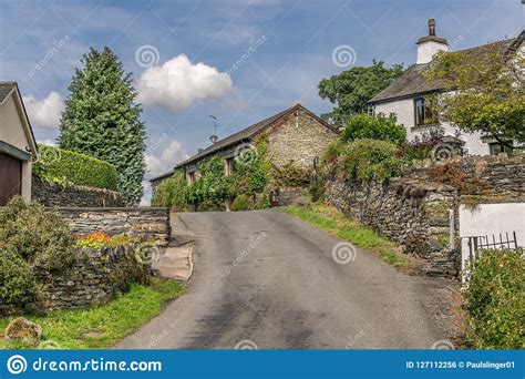 A Road Through A Traditional British Village Stock Photo Image Of