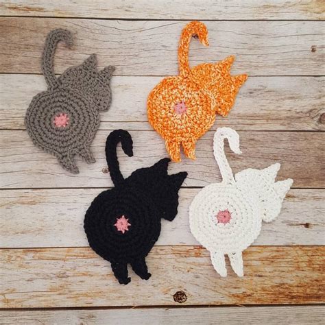 crocheted cat butt coasters are the purr fect protection