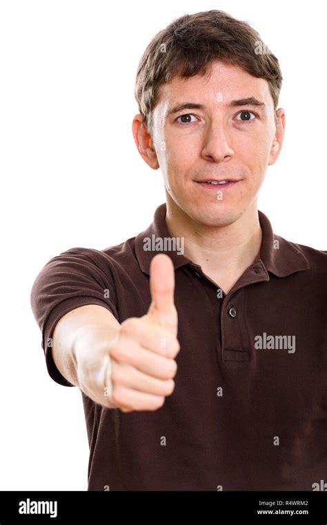 Studio Shot Of Man Giving Thumb Up Stock Photo Alamy