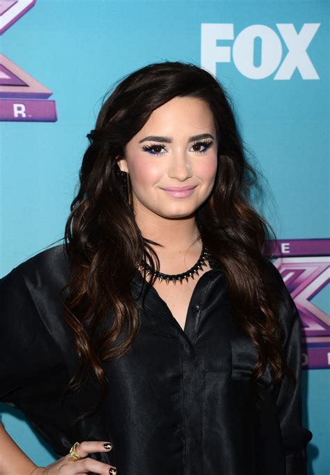DEMI LOVATO at The X Factor Season Finale News Conference in Los Angeles - HawtCelebs
