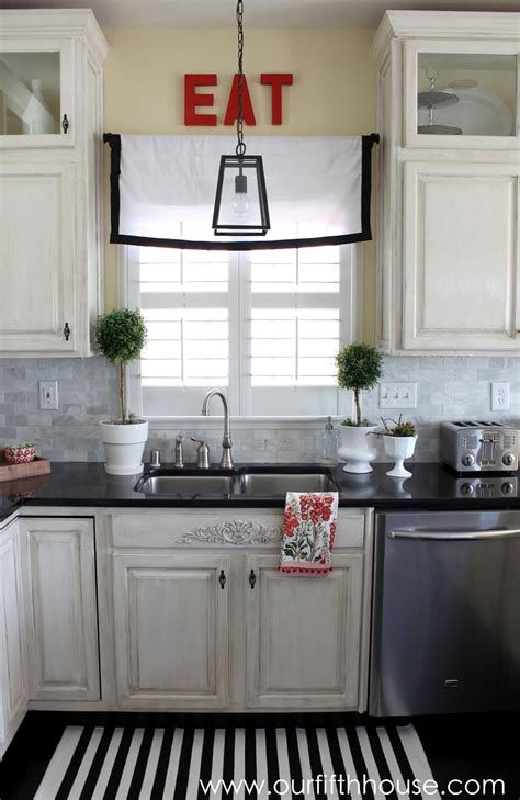 Typically, pendant lighting isn't used as a targeted accent light the way, say, a picture light would highlight a painting. New Kitchen Lighting - A Lantern Over the Sink | Kitchen sink lighting, Over kitchen sink ...