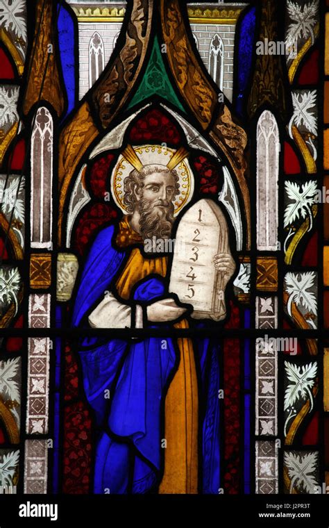 Stained Glass Window Depicting Moses With The Ten Commandments Tablet