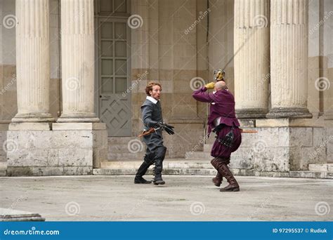 Musketeers Sword Fight Near Renaissance Castle In France Editorial