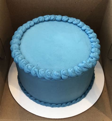 This Double Layer 6” White Cake With Blue Buttercream Frosting Was For