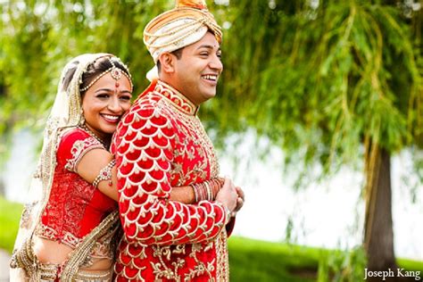 indian wedding portraits bride groom outdoor red sherwani lengha photo 11848