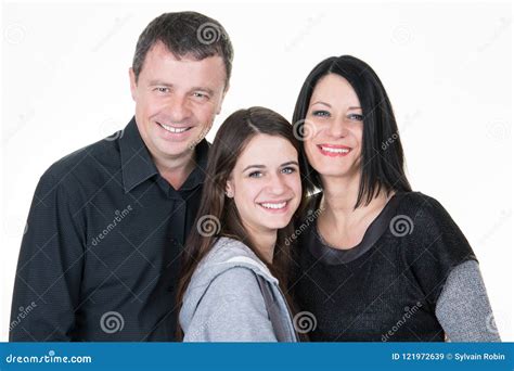 Padre Y Madre Con Feliz Interior De La Hija Adolescente Imagen De