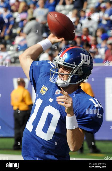 New York Giants Quarterback Eli Manning Throws A Pass Before An Nfl