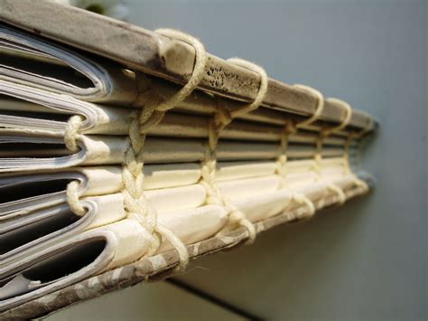 Exposed Signatures Stitched With Thick Cord With Natural Book Covers