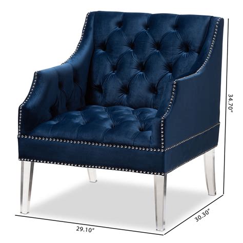 Bring a touch of modern design to your space in a cinch with this simply chic dining chair. Baxton Studio Silvana Modern and Contemporary Navy Velvet Fabric Upholstered Lounge Chair with ...