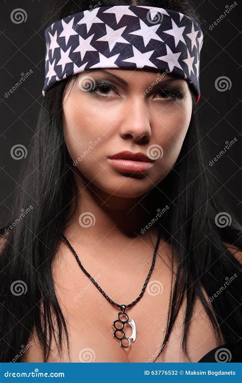 Portrait Of Topless Girl With Weapon And American Flag Stock Photo