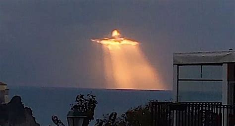 photo of christ coming in clouds of sky goes viral wnd by joe kovacs