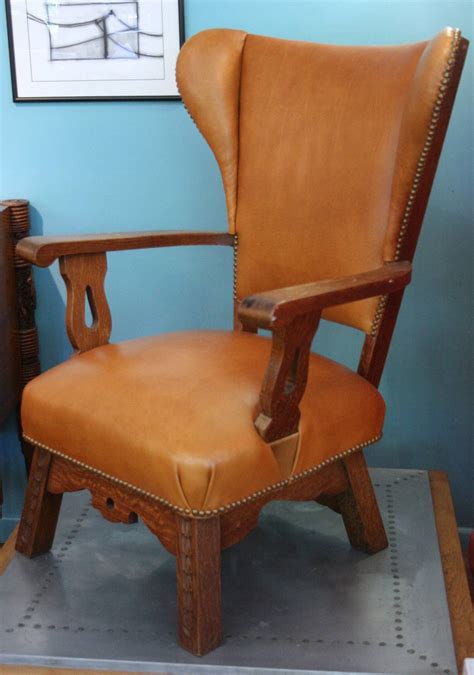 The langham dining chair is a unique contemporary design that is functional and stylish, and is great as a dining chair or as an. Oak and caramel leather wing chair For Sale at 1stdibs