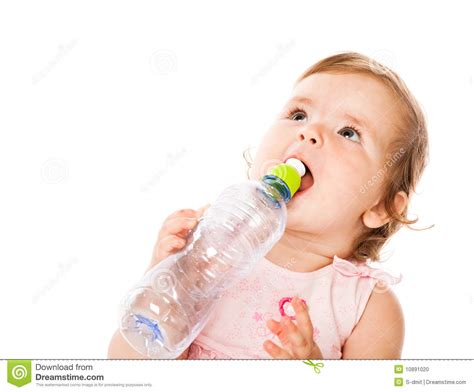 Little Girl Is Drinking From Bottle Stock Photo Image