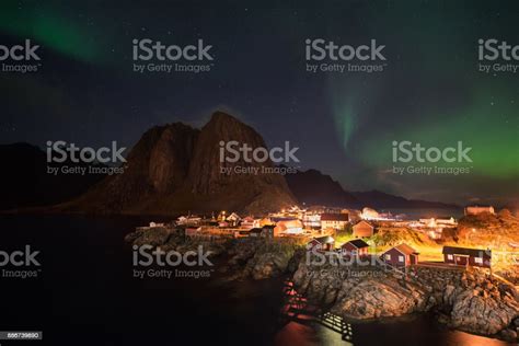 Northern Lights Over The Hamnoy Village Lofoten Islands Norway Stock