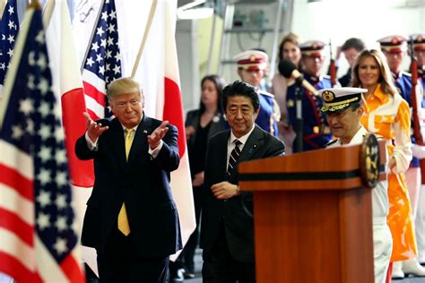 The Latest Trump Visits Japanese Troops Aboard Destroyer