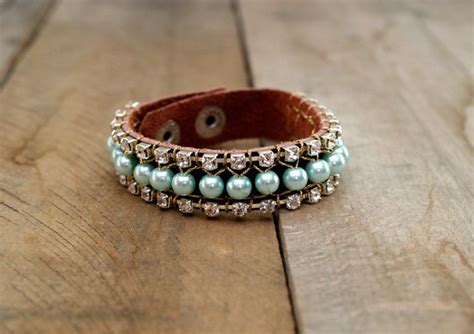 I made my bracelets 8.5″ long by 1 to 2″ tall. Aqua Blue Pearl DIY Leather Bracelet | AllFreeJewelryMaking.com