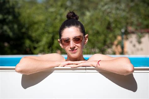 Portrait Of Model Brunette In Sunglasses In Pool Stock Image Image