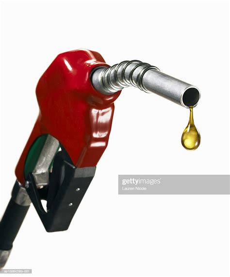 Gasoline Nozzle With Drop Of Oil Closeup High Res Stock Photo Getty