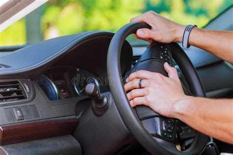 Man S Hand On The Steering Wheel Of A Car Stock Image Image Of