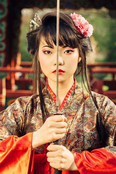 Beautiful Geisha In Kimono With Samurai Sword Female