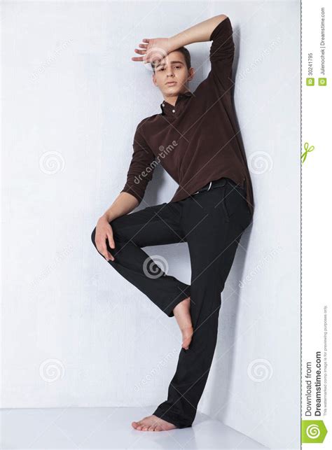 Young Male Fashion Model Posing In Casual Outfit Stock