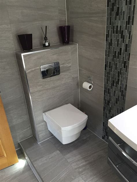 Wall Hung Toilet Pan Raised Flooring Into The Room With Chrome Edging