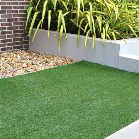 Lay turf onto base and position where needed. How to Lay Artificial Grass | Wilkolife