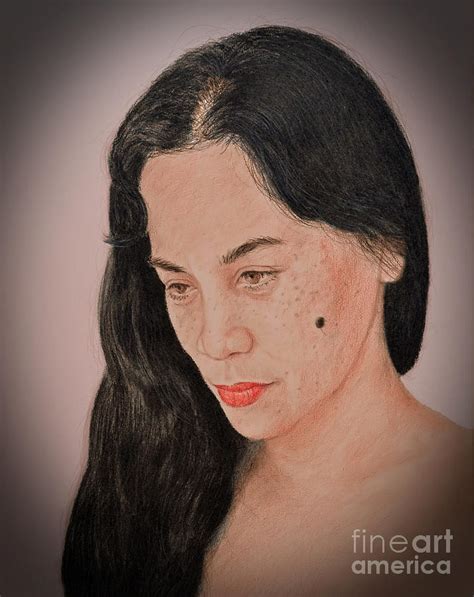 Portrait Of A Long Haired Filipina Beautfy With A Mole On Her Cheek