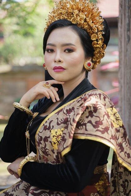 premium photo attractive woman wearing traditional black balinese kebaya with woven cloth