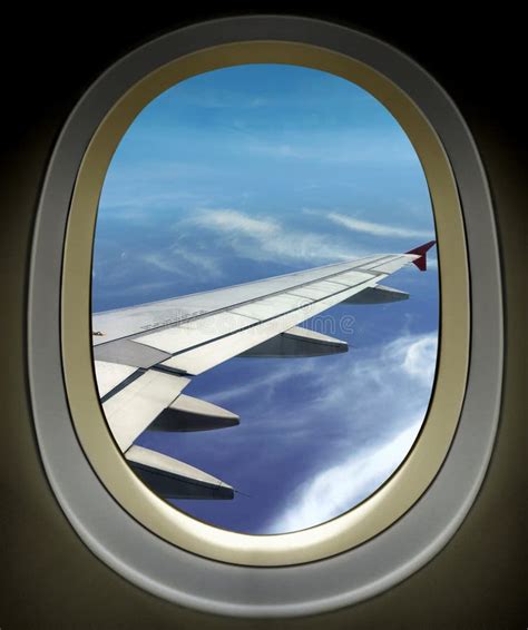 Airplane Window Wing View And Cloudy Blue Sky Stock Photo Image Of