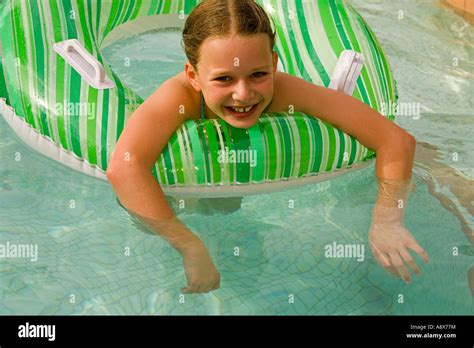 An Eleven Year Old Girl Enjoys A Pool In A Desert Hot Springs Resort California United States Of