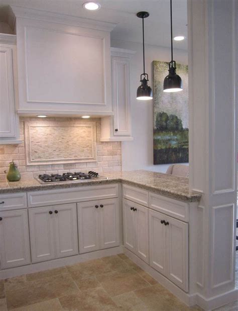 Do not put a backsplash behind your fridge unless you can clearly see that wall. White Cabinets Stone Backsplash 2021 - glennbeckreport.com
