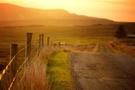 Sunset In Connemara Scenic Irish Countryside Road Leading Towards