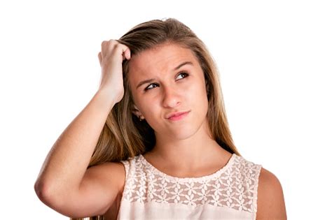 Pensive Teenage Girl Thinking Of The Options Stock Photo Download