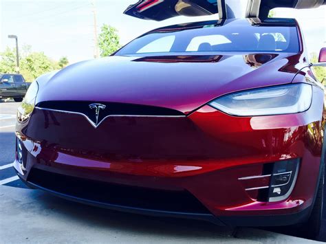 Tesla X With Falcon Wing Doors Model X Is The Safest Fastest And Most