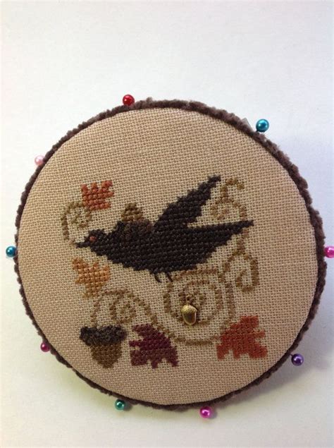 Hand Stitched Cross Stitched Round Pin Keep With Blackbird And Acorns