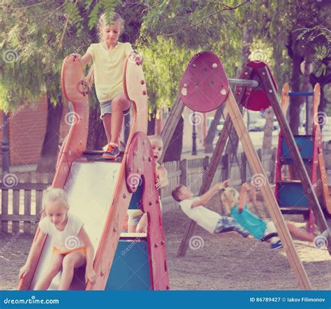 ﻿kids Playing On Playground Stock Image Image Of Enjoyment Park