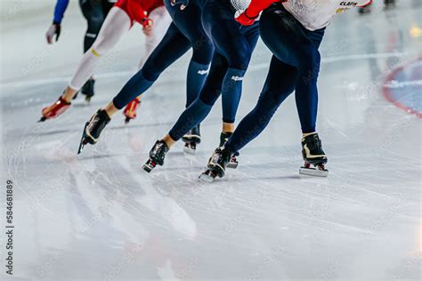 Group Speed Skaters Athletes At Speed Skating Competition Skin Suit