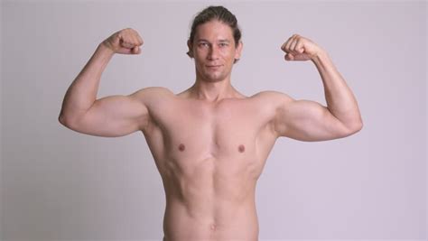 Handsome Muscular Man Flexing Biceps Stock Footage Video