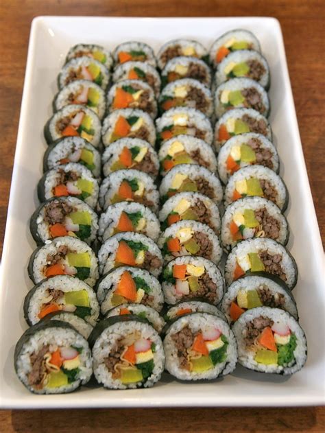 My channel is all about cooking, eating, and enjoying korean cuisine with your family and friends.\n thank you for sharing your recipes. 김밥 - Kimbap | Kimbap - not just made with Maangchi's rec… | Flickr
