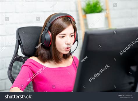 Profile Of Young Asian Pro Gamer Girl Playing In Online