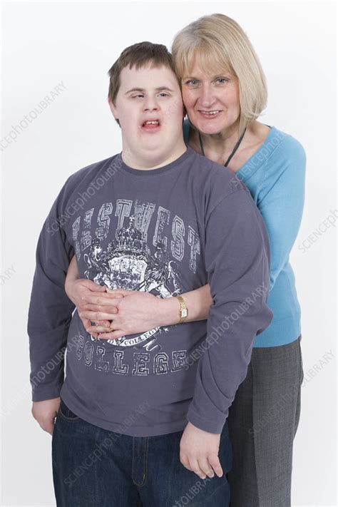Portrait Of A Mother And Teenage Son With Down Syndrome Stock Image