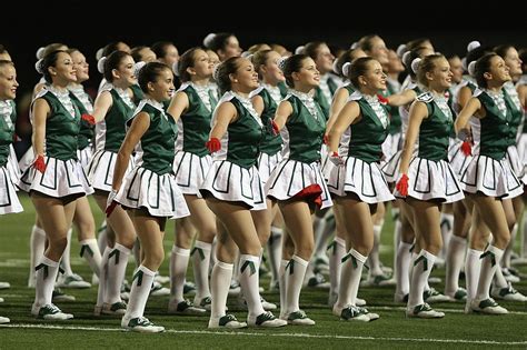 Group Of Cheerleader On Green Field · Free Stock Photo